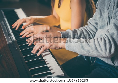 Similar – Image, Stock Photo Crop woman playing piano at home