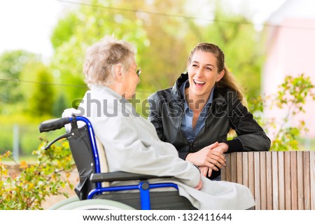 Similar – Image, Stock Photo Woman visiting her grandmother in isolation during a coronavirus pandemic