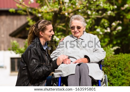 Similar – Image, Stock Photo Woman visiting her grandmother in isolation during a coronavirus pandemic