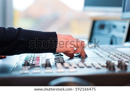 Presenter in radio station hosting show for radio live in Studio