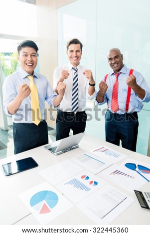 Indian CEO reporting success in business meeting