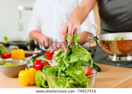 Similar – Image, Stock Photo Person mixing vegetable mixture with green spoon