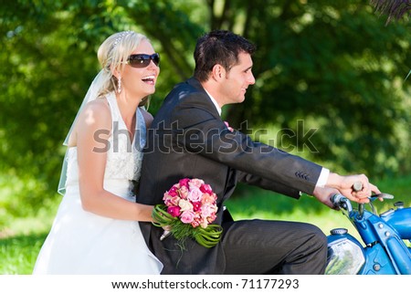 Wedding couple on a motor bike riding in the future