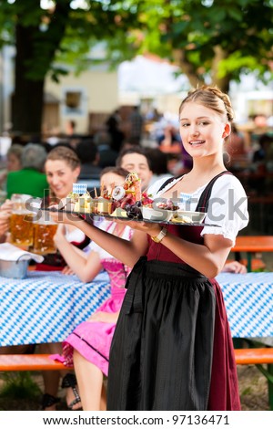 Beer Garden Restaurant In Bavaria, Germany - Beer And Snacks Are Served ...