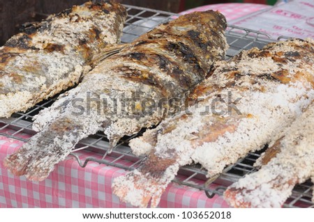 Roasted tilapia fish on grill