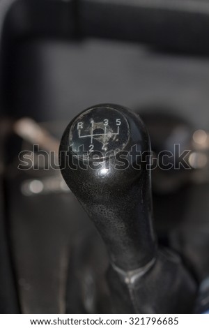 The gear change lever five speed gear stick closeup,Monochrome,select focus