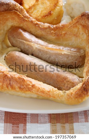 Toad in the Hole a British dish of sausages cooked in Yorkshire pudding