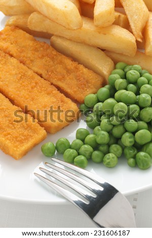 Fish fingers chips and peas a popular children\'s menu item