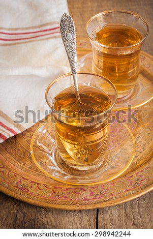 Turkish apple tea a sweet apple flavoured beverage served in Turkish tea glasses