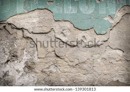 vintage exterior rendered wall with fragments of letters background
