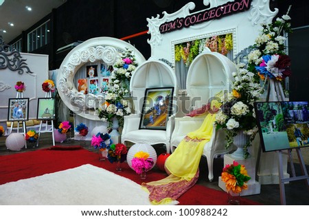 LUMUT, MALAYSIA - APR 22: Wedding photographer booth from Amanda Studio promote their services to visitors during Perak Bridal Carnival at Marina Island Hall on Apr 22, 2012 in Lumut Perak, Malaysia.