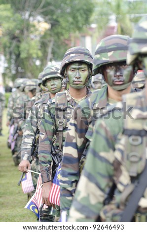 PAHANG, MALAYSIA - SEP 16 : Unidentified Royal Ranger participates in National Day and Malaysia Day parade, celebrating 54th anniversary of independence on September 16, 2011 in Pahang, Malaysia