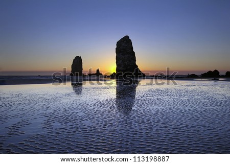 Haystack Needles Rocks at Cannon Beach Oregon Coast during Low Tide at Sunset