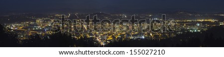 Portland Oregon Cityscape at Blue Hour with Silhouette of Mount Hood and Cascade Range Panorama