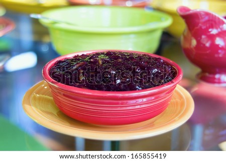 Cranberry Sauce in Red Bowl for Thanksgiving Dinner Closeup