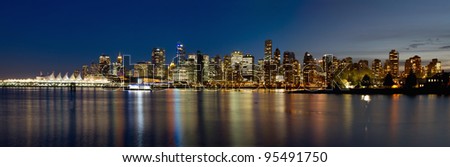 Vancouver BC Canada Skyline along False Creek from Stanley Park at Blue Hour Panorama