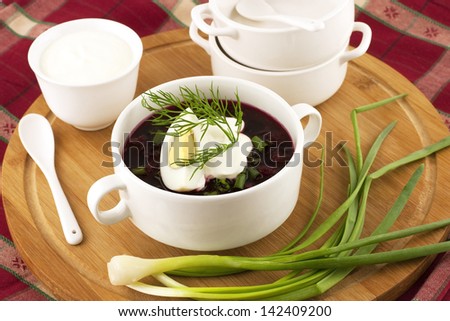 Summer cold soup with beet, cucumber and onion