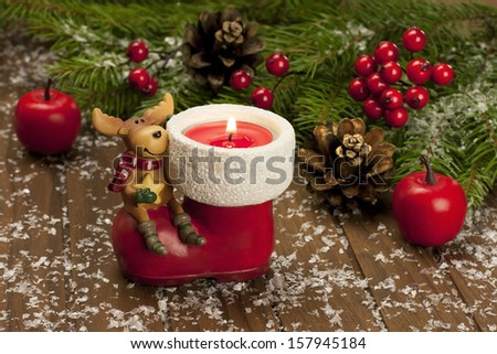 christmas still life with ceramic candle holders