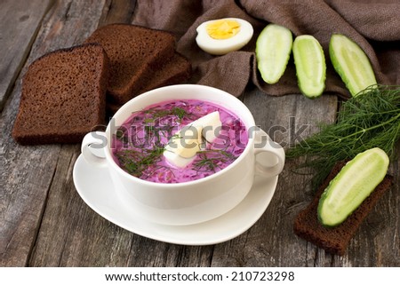 Traditional  Russian cold  soup made of beets, cucumbers and herbs with egg and sour cream