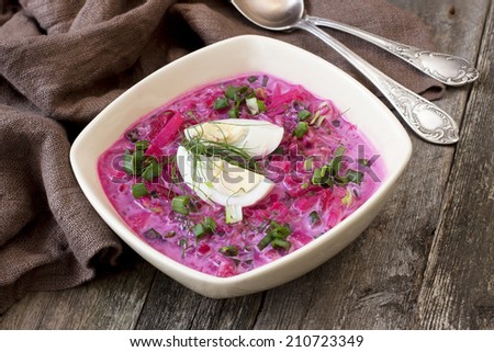 Cold vegetable soup with beet, cucumber and sour cream