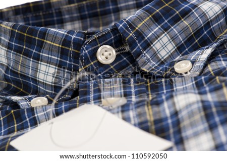 Closeup of blue color shirt for men in checked pattern