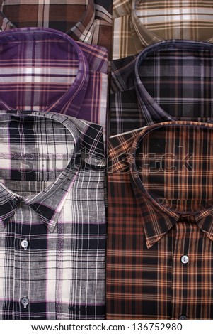 Casual men\'s shirt with a checked pattern