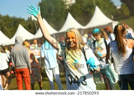 MOSCOW, SEPTEMBER 6, 2014: Color Fest September 2014 in Moscow. Roots of this fest are in India, where it called Holi Fest. Now russian people celebrate it too.