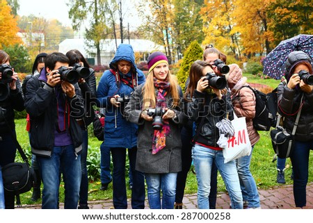 MOSCOW, OCTOBER 26, 2015: Outdoor workshop for photographers in autumn park in Moscow, October 26, 2015.
