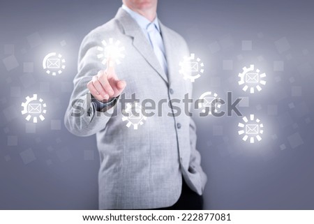 business man in gray suit on the virtual keyboard sends email