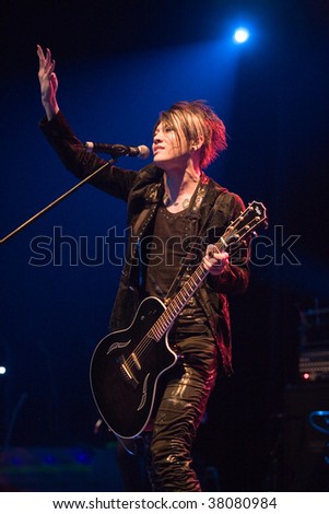 BUDAPEST - OCTOBER 01: Japanese singer and guitarist Miyavi and his band perform at the stage of Pecsa on October 01, 2009 in Budapest, Hungary.