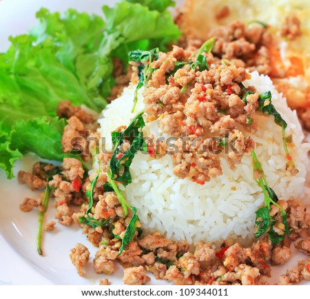 Thai food Thai spicy food, Fried pork with sweet basil.whit basi