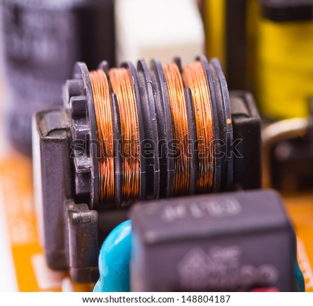 Copper coil electronic components on printed circuit board