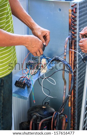 Technicians were repairing air-conditioning