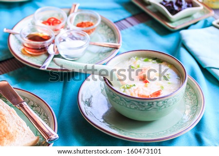 Asian style breakfast soft boiled rice, rice soup Thailand food