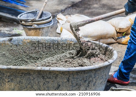 Construction workers cement