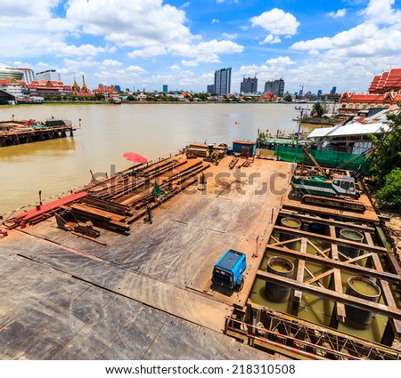 NONTHABURI -THAILAND - SEPTEMBER 4 : Concrete bridge across Chao phraya river under-construction of its deep long pile foundation on September 4, 2014 in Nonthaburi, Thailand