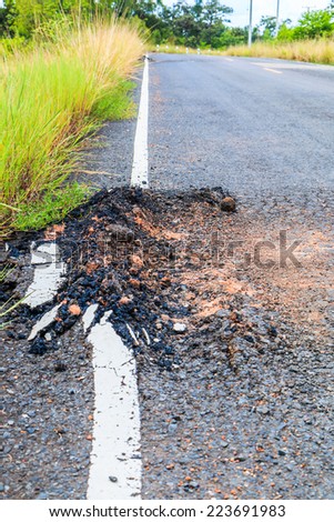 damaged road Road to Ruin cracked asphalt