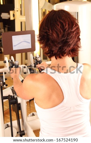 Woman doing workout in gym for  physiotherapy