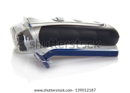 The disposable safety razor and the electric razor is isolated on white