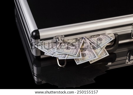 Silver case with money on white background