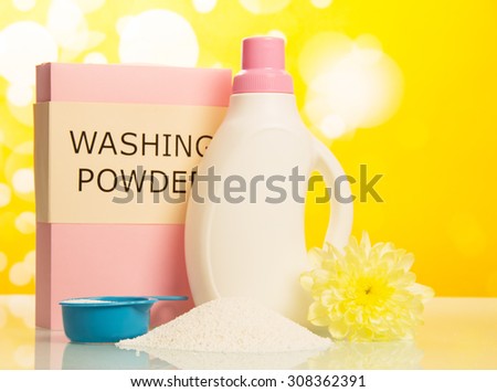 Pink washing powder and Cleaning item on yellow