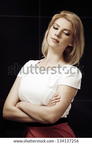 Sad young woman looking down