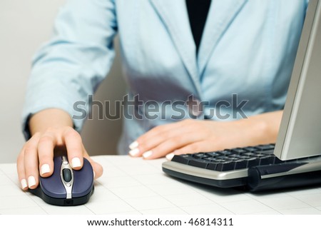 Female hands working on PC.