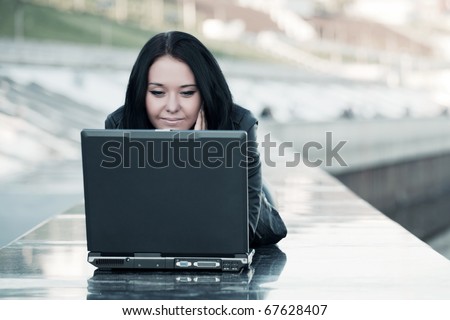 Young woman with laptop.