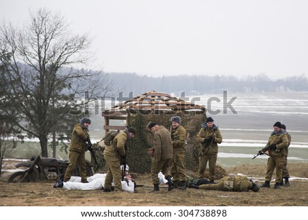 MINSK AREA, BELARUS - JANUARY 22, 2015: Reconstruction of the Afghanistan war in Stalin\'s line at day of the rescuer.