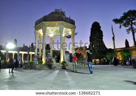 SHIRAZ, IRAN - CIRCA AUGUST 2012: People visit tomb of poet Hafez circa August 2012 in Shiraz, Iran. Hafez was the most famous poet in Iran.