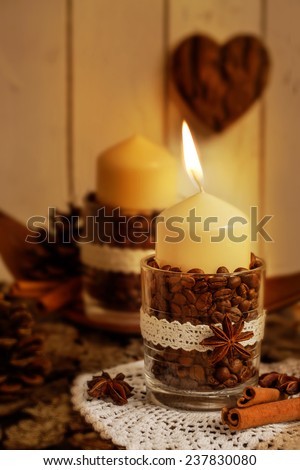 Handmade decoration with candles for Christmas in vintage style. Christmas greeting card. Ideas for holiday gifts.