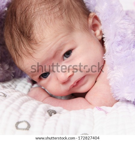 Adorable Newborn baby girl taken closeup
