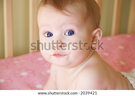Little Baby Girl taken closeup in Crib