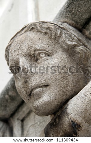 One head on the wall of cathedral in Shibenik, Croatia